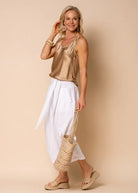 The White Addison Linen Pants by MIRRA MIRRA by IMAGINE FASHION are available at Rawspice Boutique.