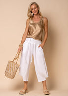 The White Addison Linen Pants by MIRRA MIRRA by IMAGINE FASHION are available at Rawspice Boutique.