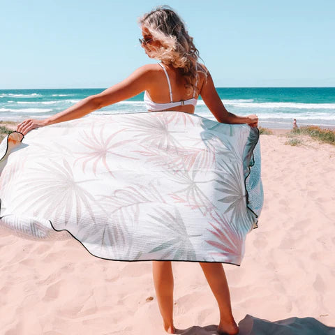 The Ultimate Beach Towel - The Whitehaven by Sky Gazer is available at Rawspice Boutique.