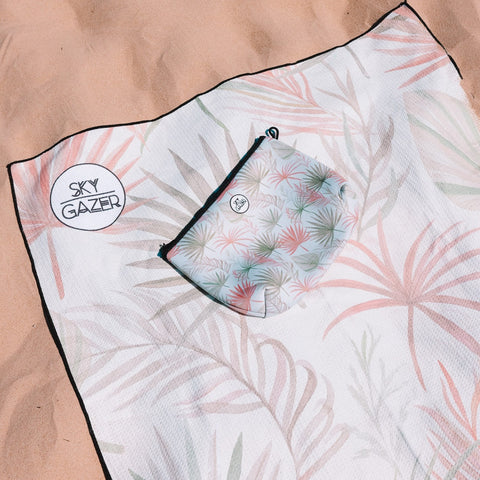The Ultimate Beach Towel - The Whitehaven by Sky Gazer is available at Rawspice Boutique.