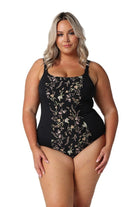 A woman modelling plus size swim wear in the Wildflowers Chlorine Resistant Tank One Piece 