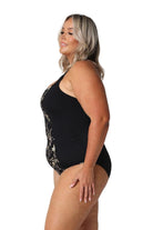 A woman modelling plus size swim wear in the Wildflowers Chlorine Resistant Tank One Piece