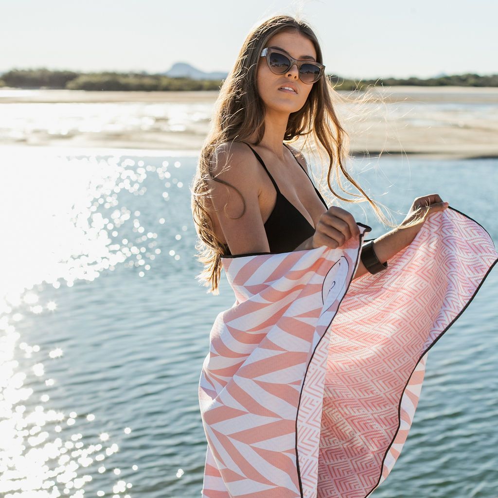 The Noosa Coral The Ultimate Beach Towel - by Sky Gazer currently available at Rawspice Boutique. 