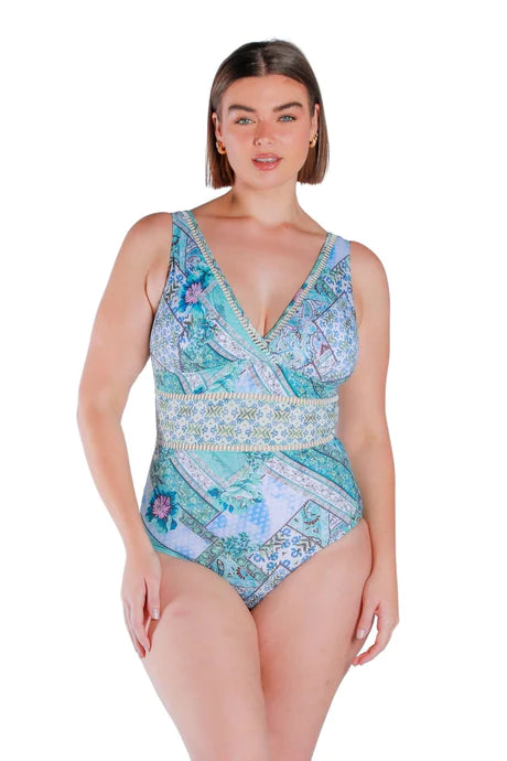 Whitehaven V Neck One Piece Swimsuit by Capriosca is available at Rawspice Boutique. 